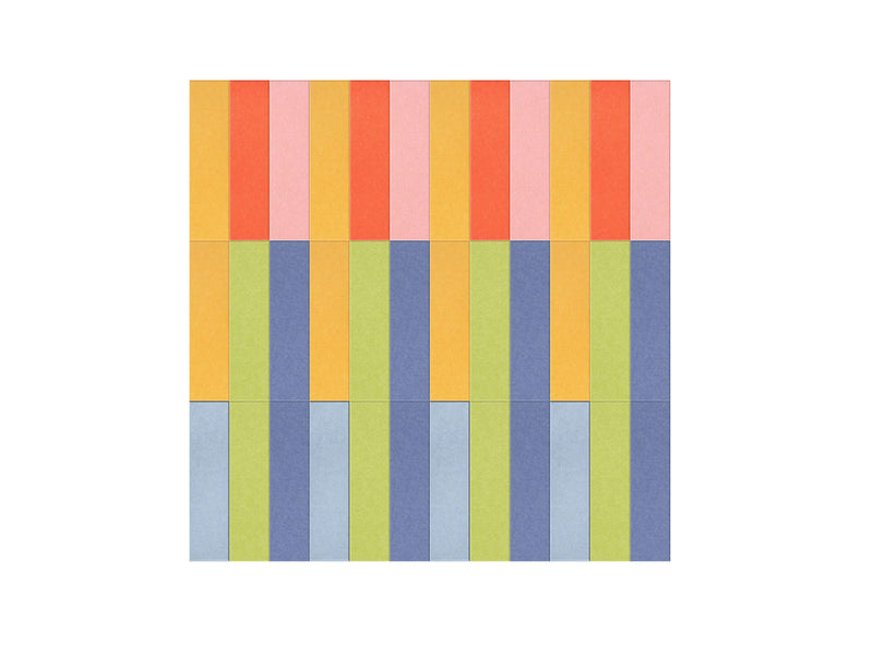 Geometric textile with vertical stripes in gold, coral, pink, green, blue, and gray arranged in repeating color blocks.
