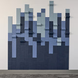image of a blue dimensional design on a white wall