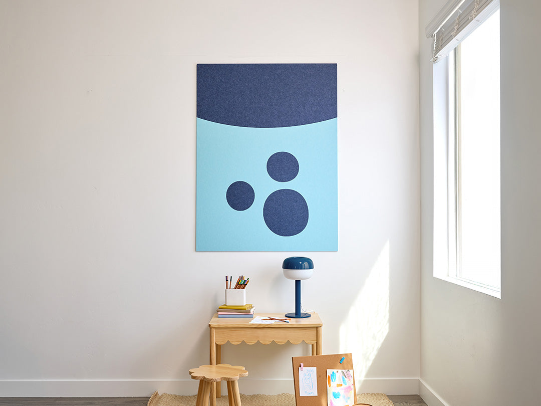 Children's room with abstract wall art, toys, and a bookshelf. Blue wall art for kids room. Bluey and Bingo Jumbo Wall art.