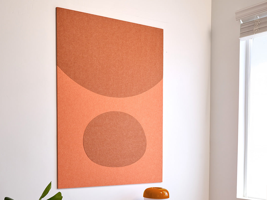 Children's room with abstract wall art, toys, and a bookshelf. Orange art for kids room. Bluey and Bingo Jumbo Wall art.