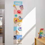 Bluey and Friends rainbow felt growth chart mounted on a wall