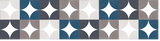Modular wall panels with geometric four-pointed star pattern in teal, charcoal, gray, and white.