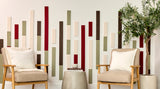 Two beige armchairs with wooden frames in front of a wall with vertical acoustic panels