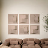 Tan felt acoustic tiles with points of dimension above a couch