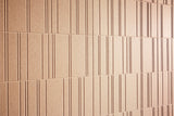 Beige acoustic wall panel with horizontal grooves