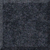 Dark gray textured tile with speckled surface and visible grout line on left edge.