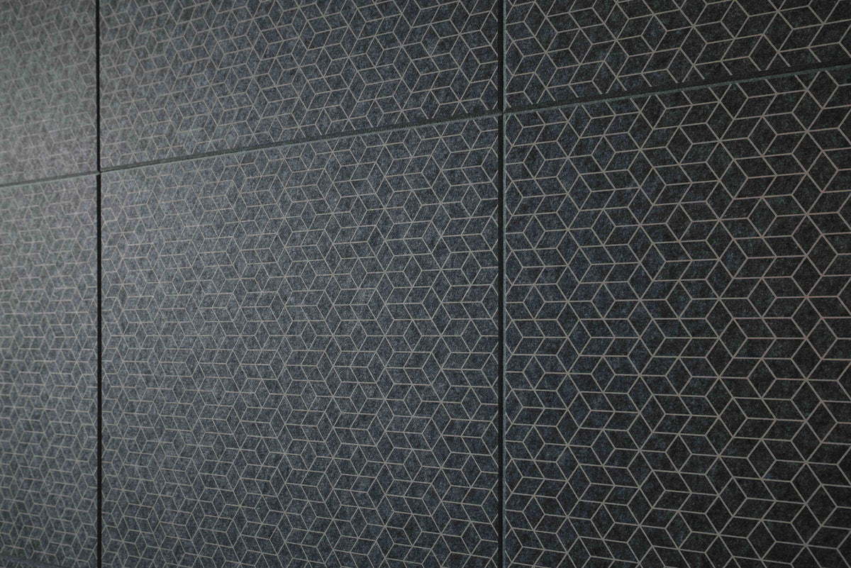 Patterned black tiles on a wall