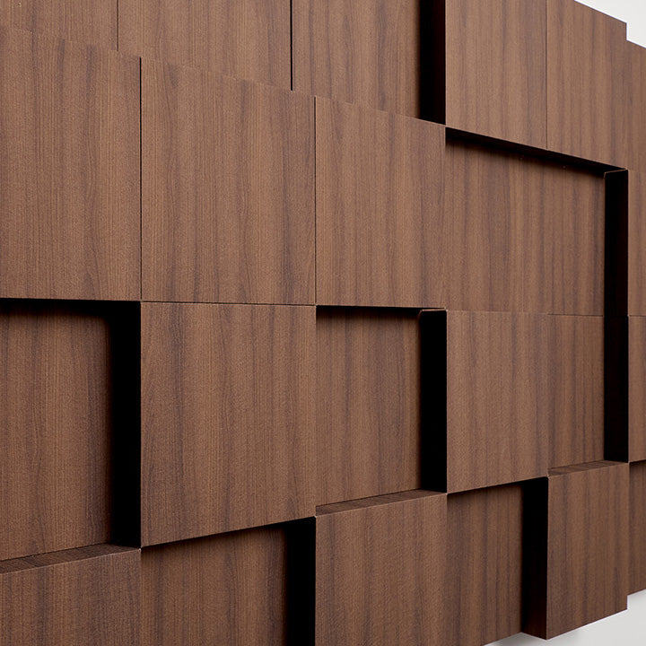 Walnut wooden acoustic boxes installed on white wall