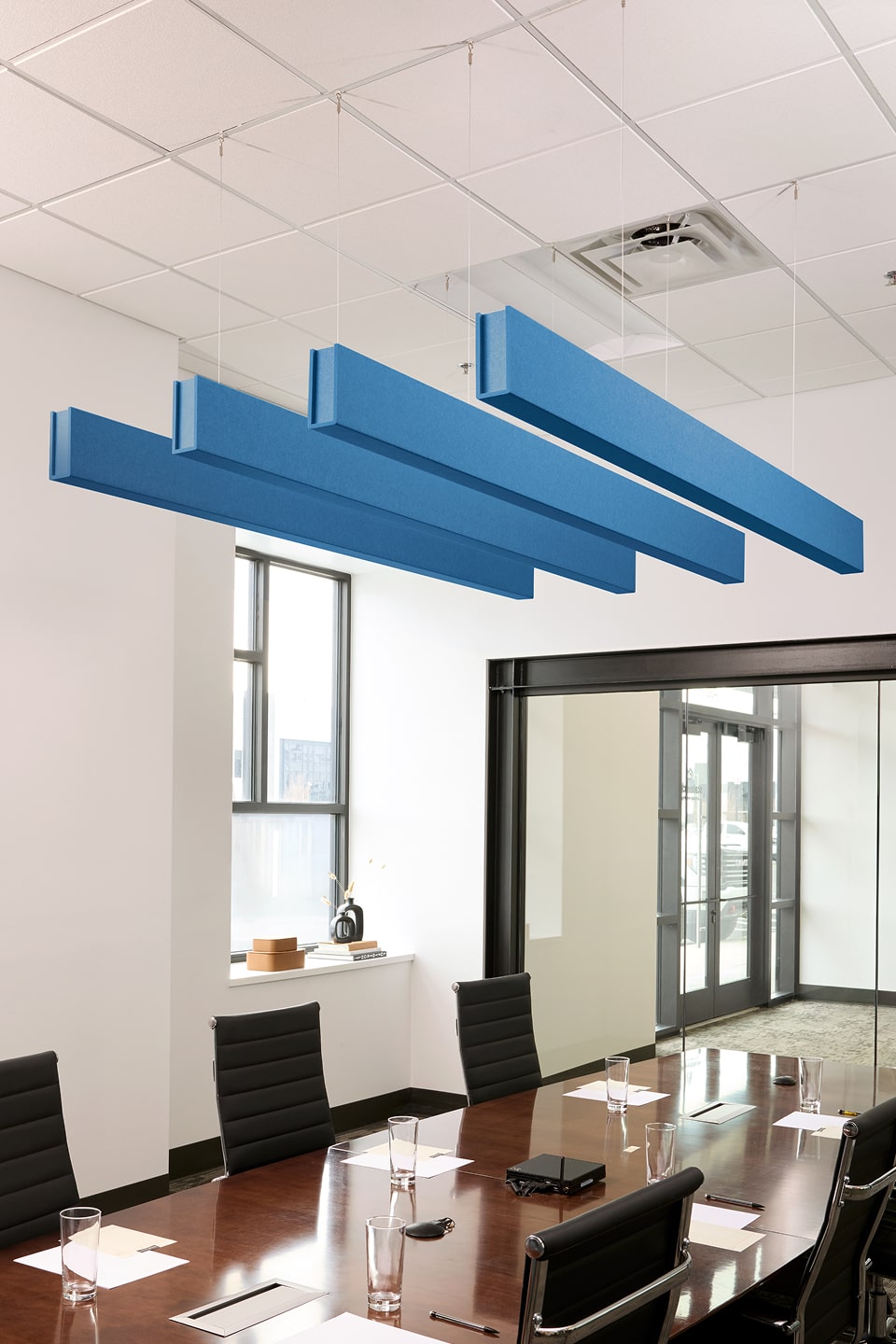 PET felt suspended acoustic beam in Cayman by Felt Right absorbs unwanted noise and looks great in any setting. Available in four or eight foot lengths. Clips into ACT grid or drills into drywall ceiling.