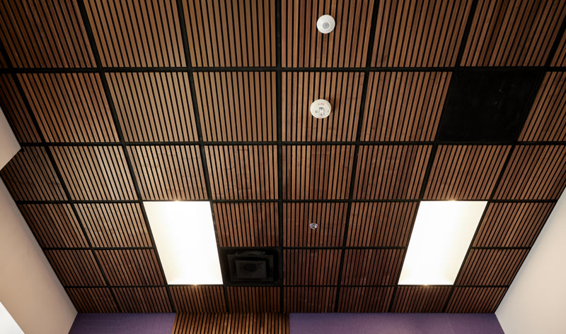 Felt Right Walnut Wood Slat Ceiling tile in a black ACT grid