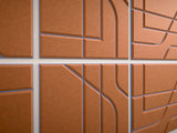 Cinnamon and periwinkle subway tile pattern with white grout lines and curved blue accents.