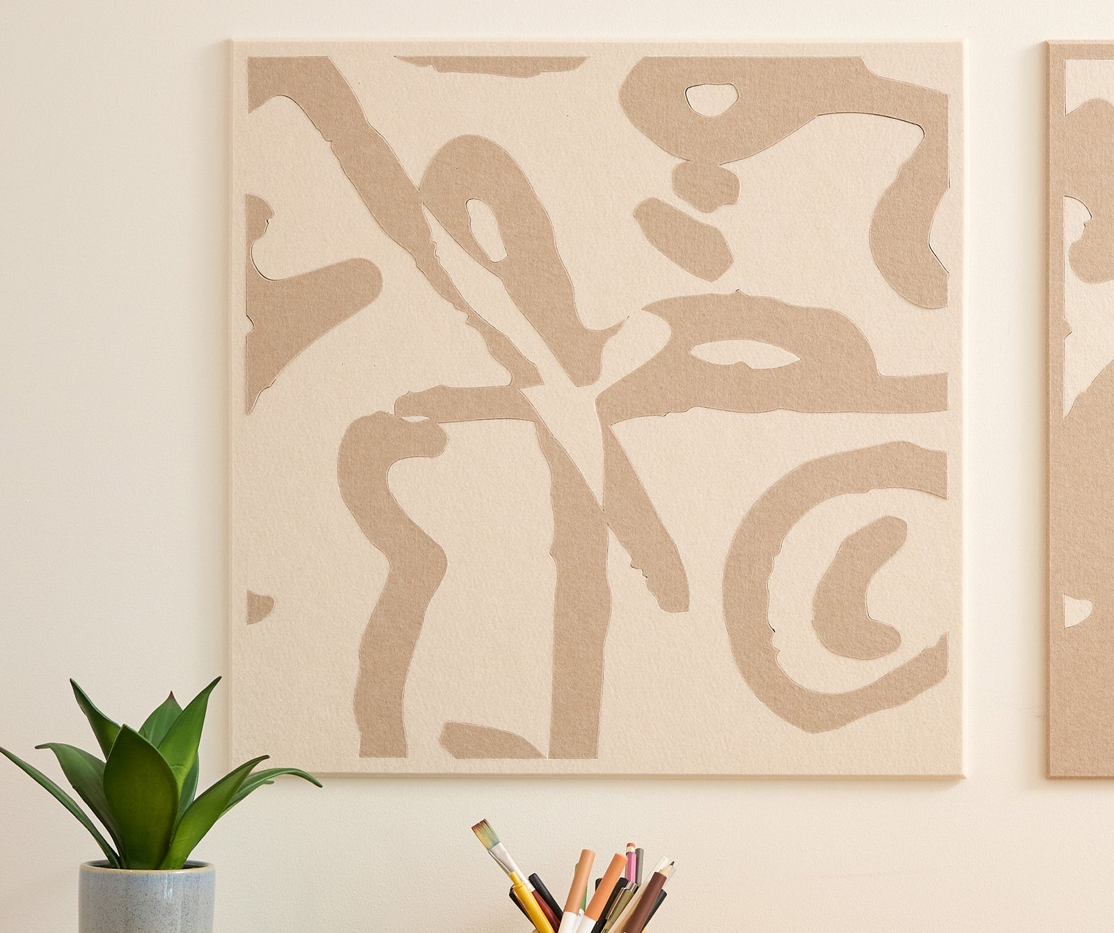 close up of 2-piece Peanuts Scribbles on wall