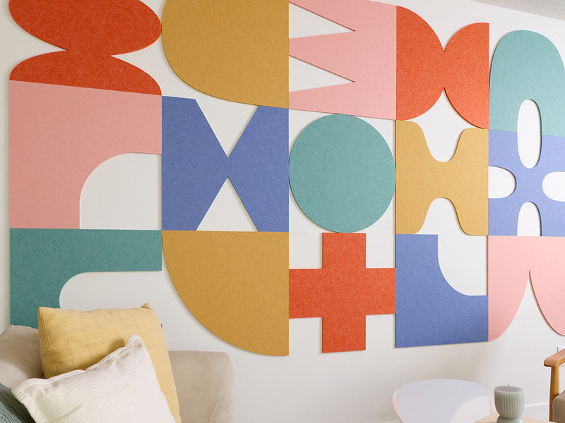 Colorful abstract wall art in a living room setting