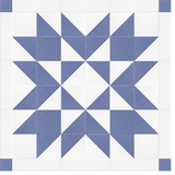 Blue and white geometric star quilt pattern with triangular patchwork design on cream background.