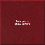 A close-up of a textured burgundy fabric surface with centered white text reading 'Enlarged to show texture'.