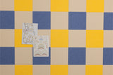 Gingham pinboard with blue, yellow, and tan squares displaying two cards with dandelion line drawings.
