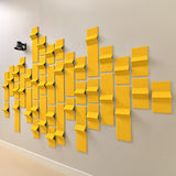 Yellow felt acoustic tiles with 3D points of dimension