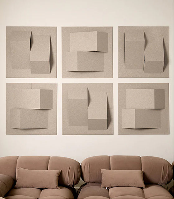 dimensional 3D acoustic wall panels above in tan, above some comfy looking couches