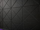 A Felt Right wall art design in the shade of black with a cross pattern engraved on the felt tiles
