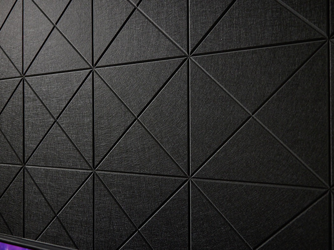 A Felt Right wall art design in the shade of black with a cross pattern engraved on the felt tiles