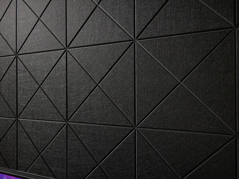 A Felt Right wall art design in the shade of black with a cross pattern engraved on the felt tiles