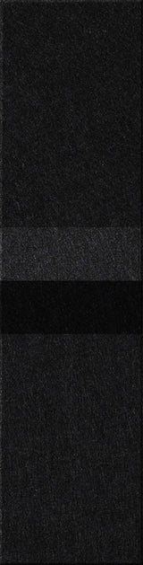 Black speckled rectangular tile with granular texture surface.