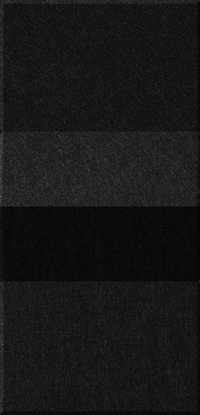 Four rectangular tiles in varying shades of charcoal gray and black arranged vertically.