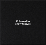 A close-up of a black textured material with the centered white text 'Enlarged to show texture'.