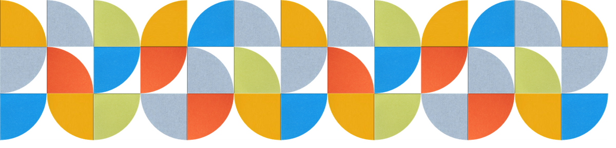 Colorful geometric pattern featuring repeating circles divided into colored quarters in yellow, blue, gray, red, and green.