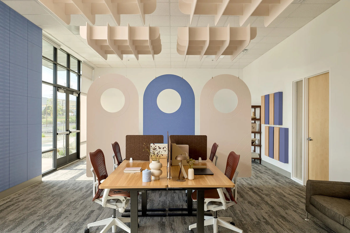 Elizabeth Olwen Peacock felt room divider in a conference room