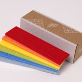 Primary color palette of felt samples with cardboard box