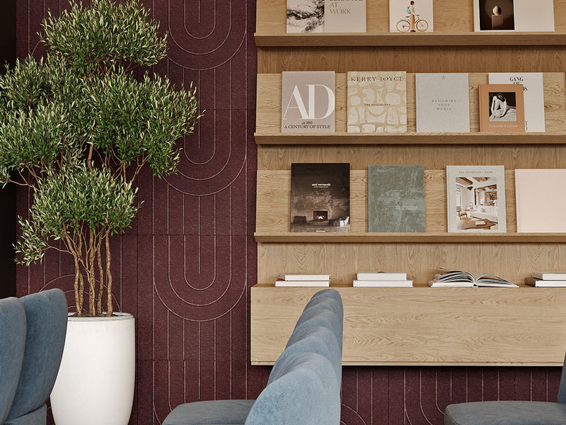 Shelving unit with books and decorative items against a wall with abstract patterns. Featuring dark red engraved panels in a Zen Pattern