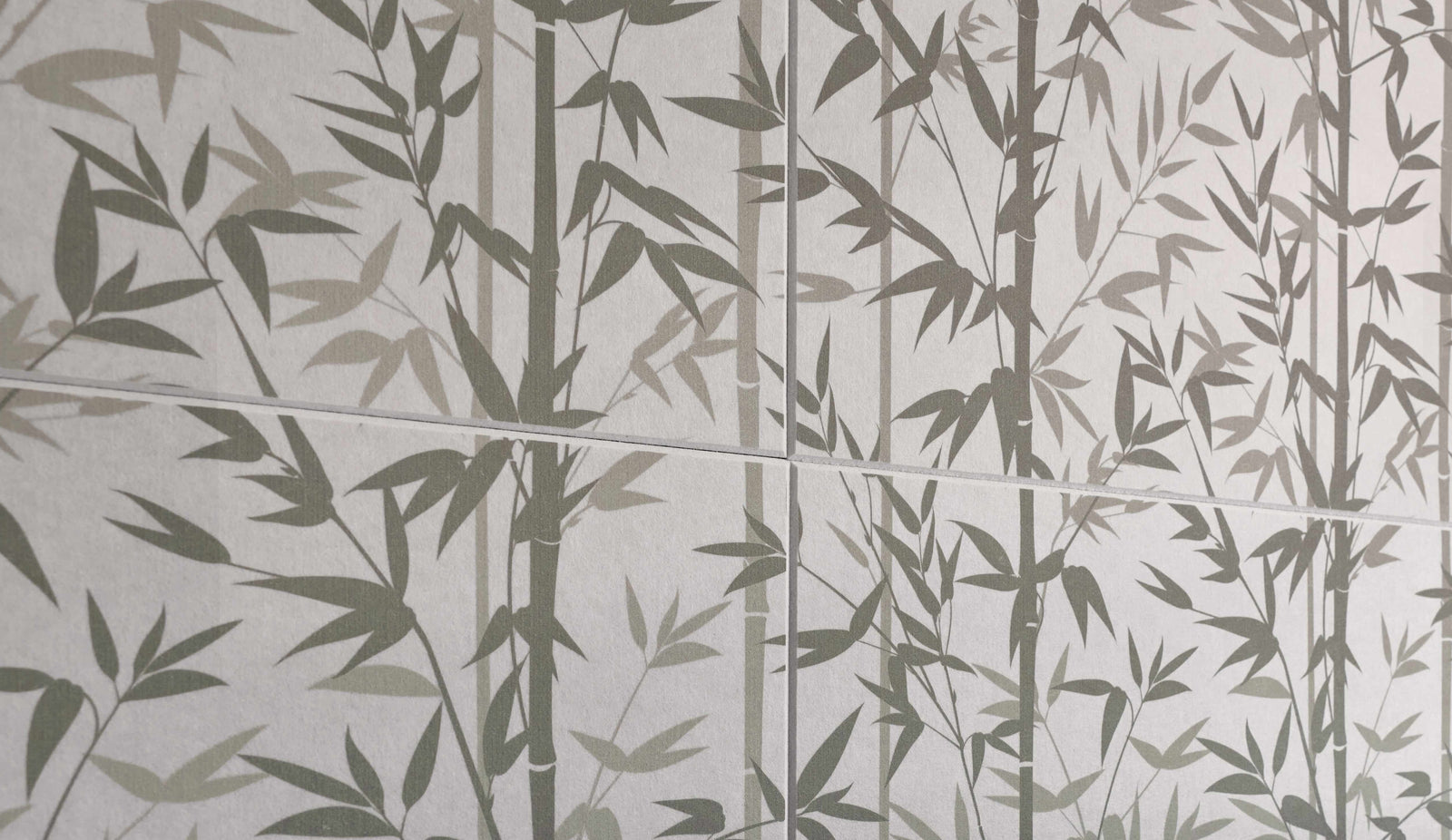 Tile pattern with bamboo design on a gray background