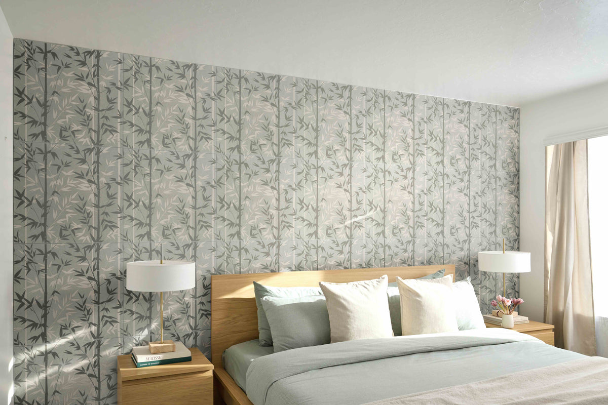 Bedroom with floral wallpaper, wooden headboard, and nightstands with lamps.