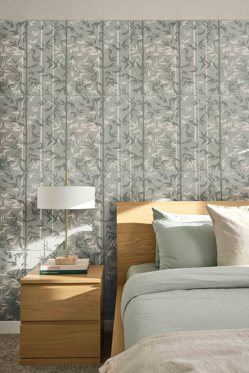 Bedroom with floral-patterned wallpaper, wooden nightstand, and bed.