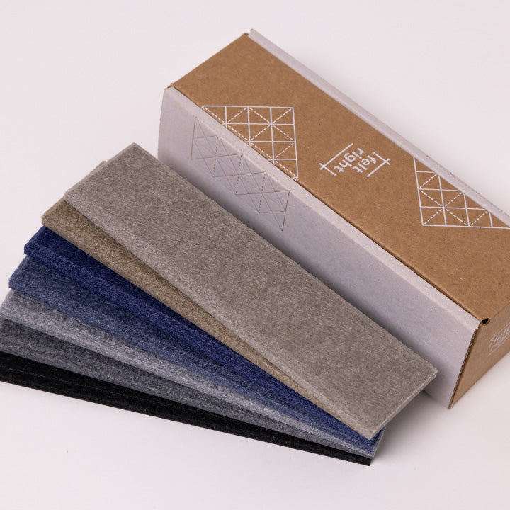 Grey and brown felt samples by cardboard box