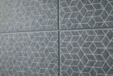 Close-up of gray tiles with geometric pattern