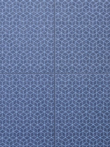Detailed close up shot of geometric patten on indigo colored felt acoustic wall tiles
