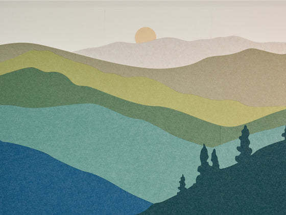 Great Smoky Mountains felt design on wall. Dark greens progressively get lighter to show mountain silhouettes with a beige sun in the background. 