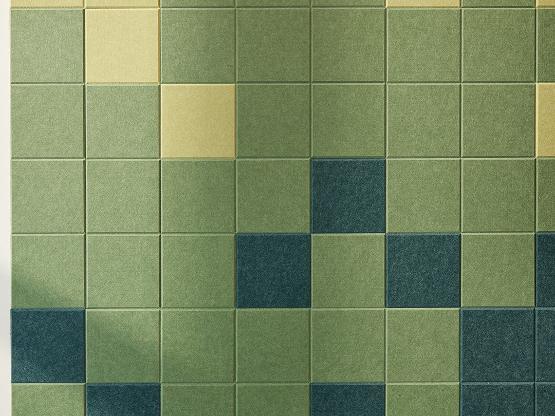 Felt Right tiles in a pixel pattern of shades of green