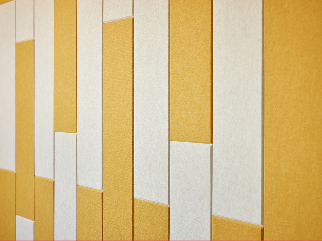 Felt Right wall art using yellow and cream shades of felt tiles to create a pattern 