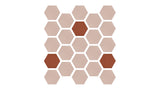 A Felt Right honeycomb patterned clay tile in a beige and brownish red color palette. 