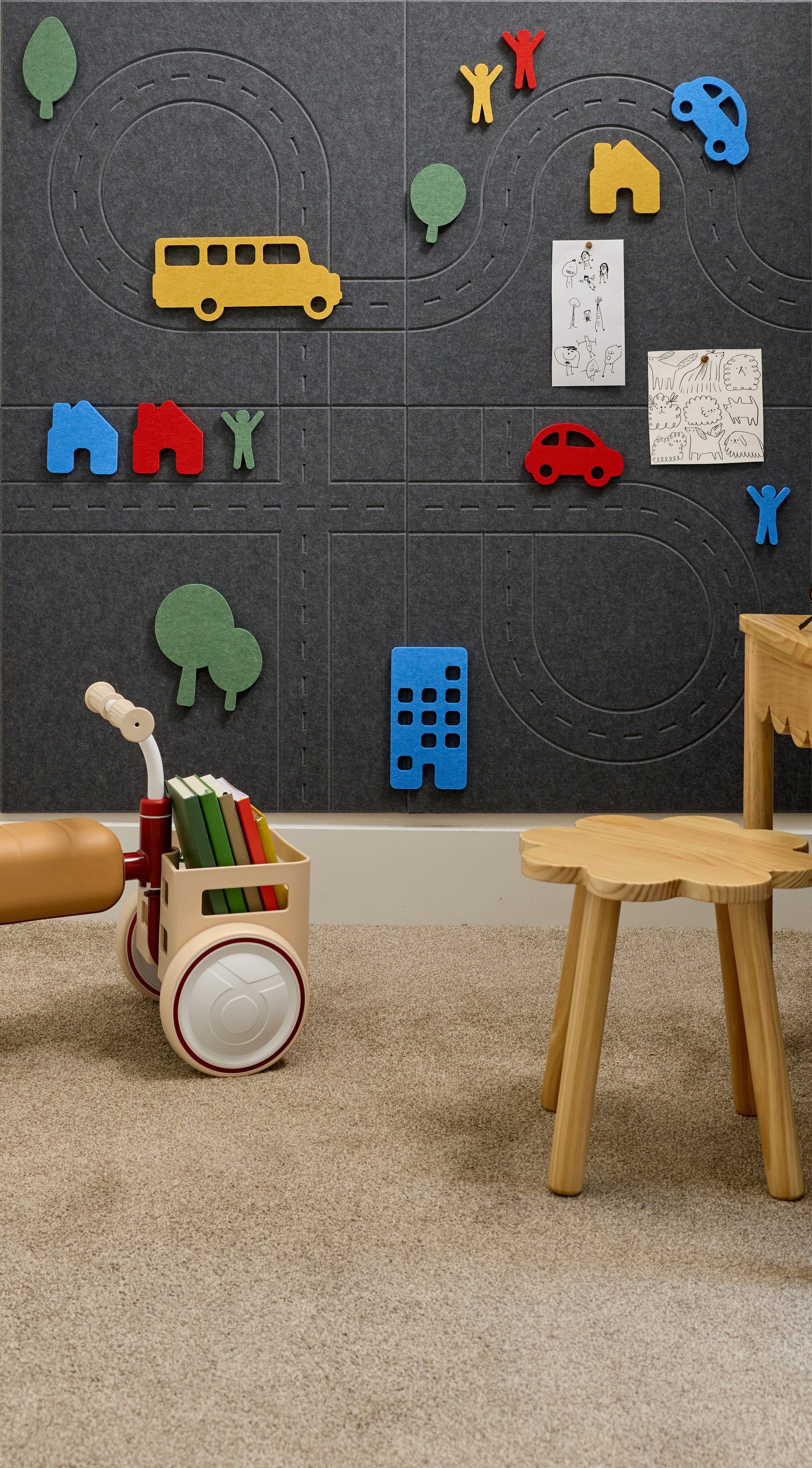 Blue and yellow 2' x 2' square felt tiles of Woodstock, the bird from the Peanuts series