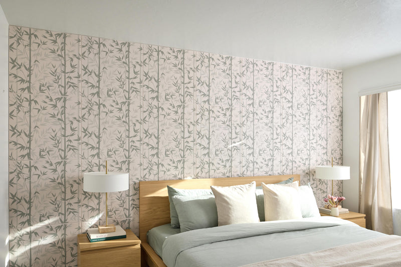Modern bedroom with floral wallpaper, wooden bed, and side tables.