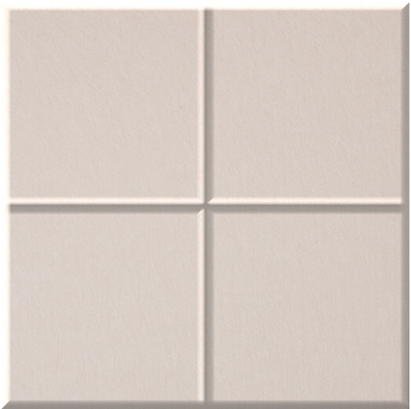 Beige ceramic tile divided into four equal squares with raised grout lines creating a grid pattern.
