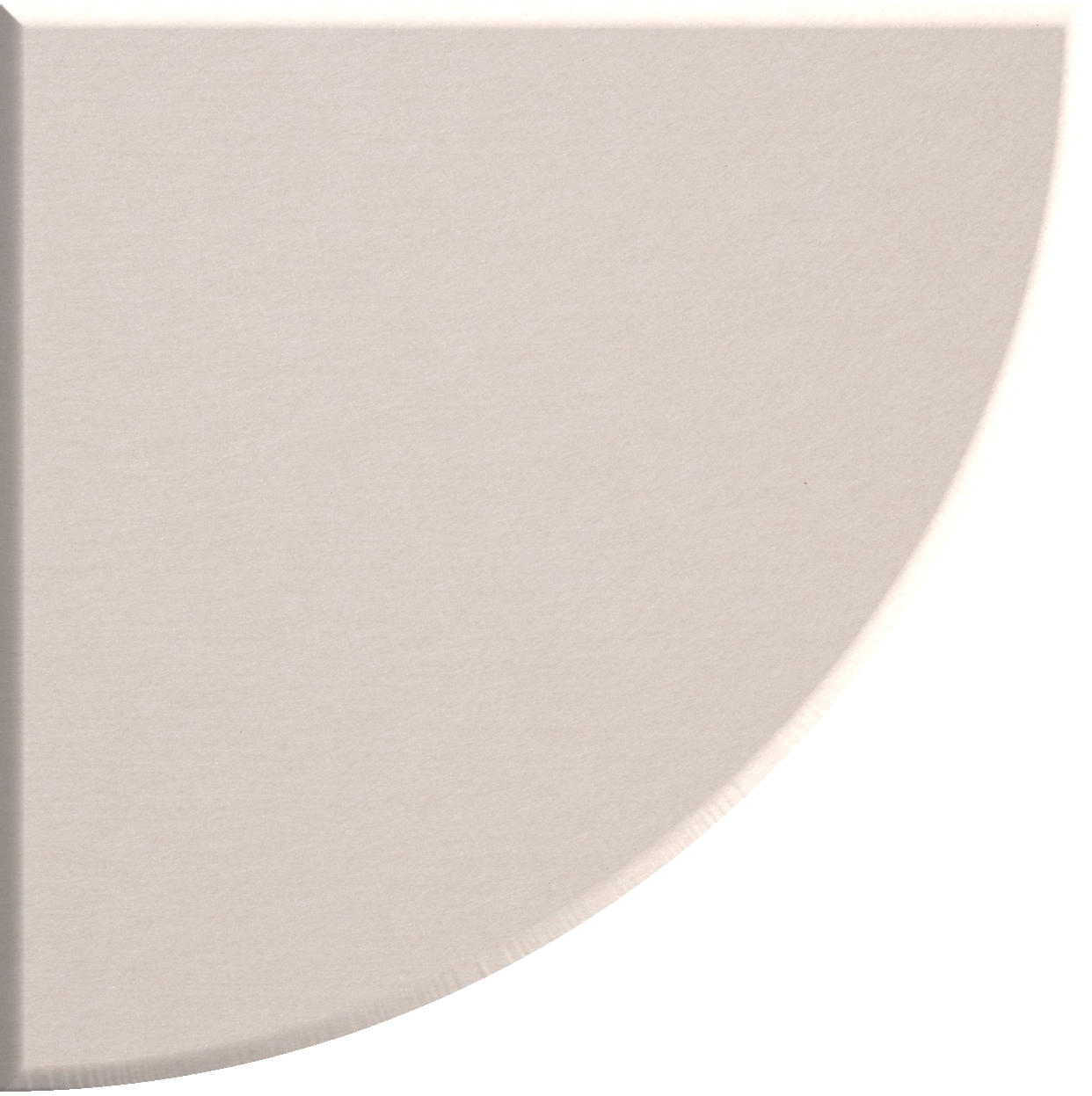 Beige quarter circle tile with curved edge and flat sides.