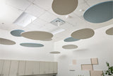 Ceiling with circular acoustic panels in various colors