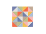 Geometric patchwork pattern with colorful triangles in blue, yellow, pink, coral, tan, and green arranged in diamond-shaped s