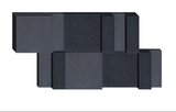 Abstract geometric arrangement of dark gray rectangular blocks in varying heights and widths.