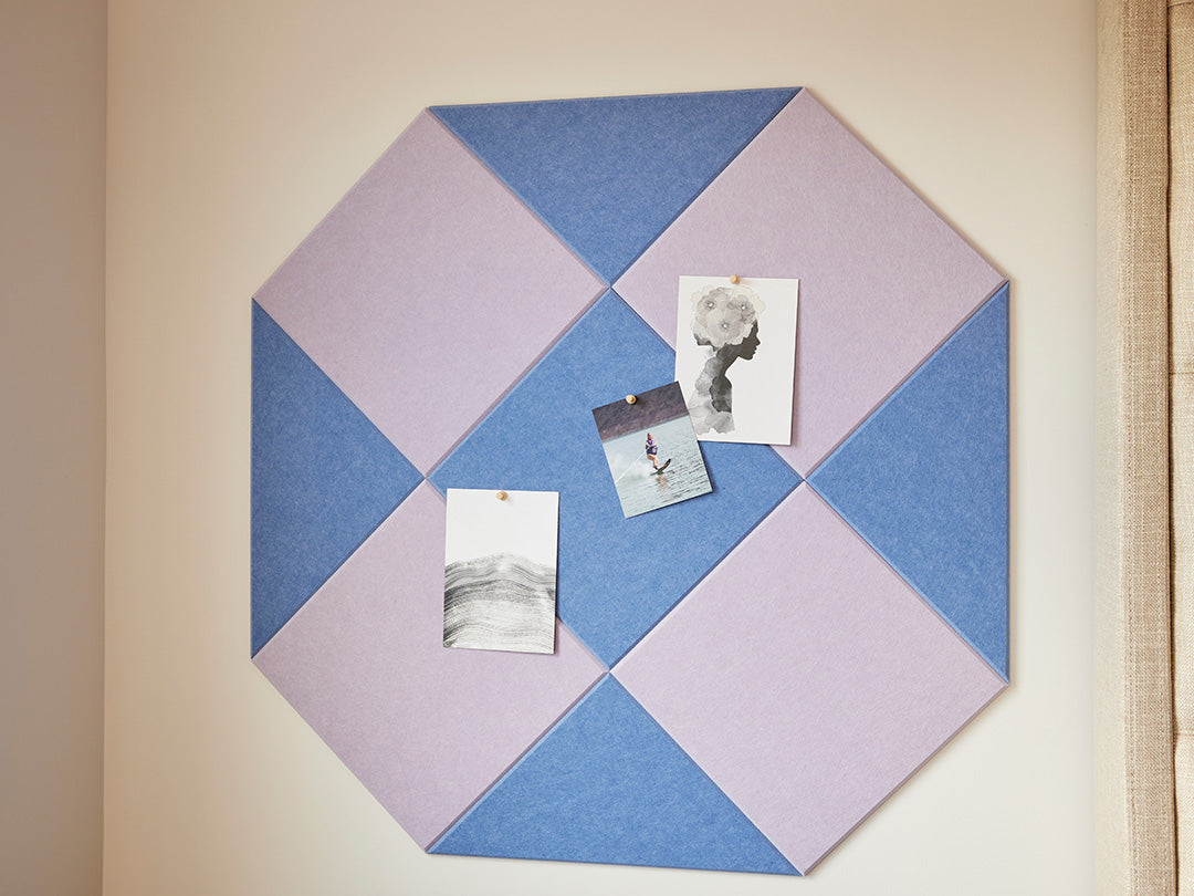 A Felt Right pinnable wall art design using shades of blue and purple on a light colored wall